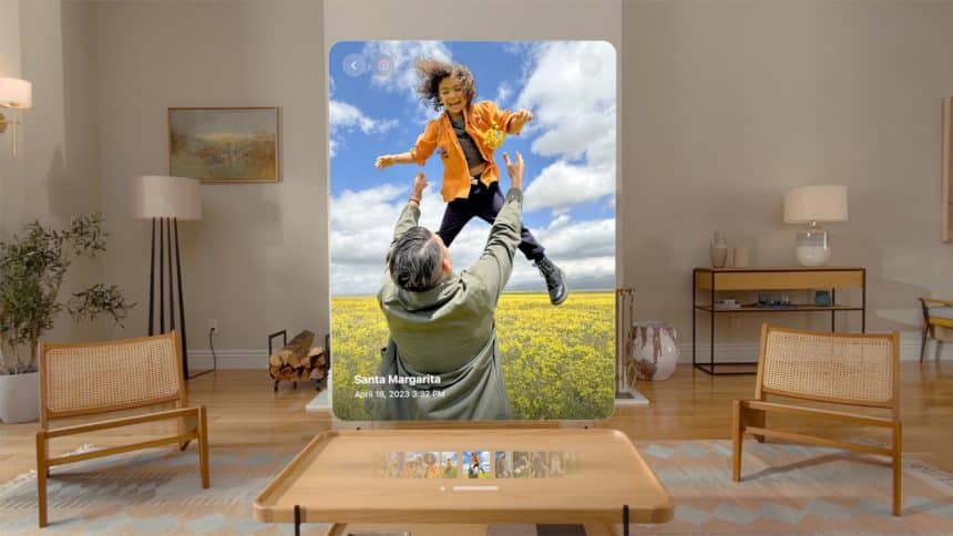 Apple Vision Pro showcasing a large floating photo in a virtual living room.