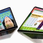 Two MacBook Air laptops with vibrant displays.