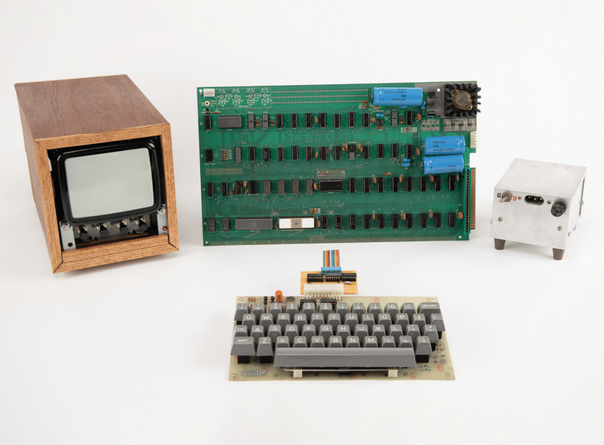 Apple-1 computer with original keyboard, monitor, power supply, and circuit board.