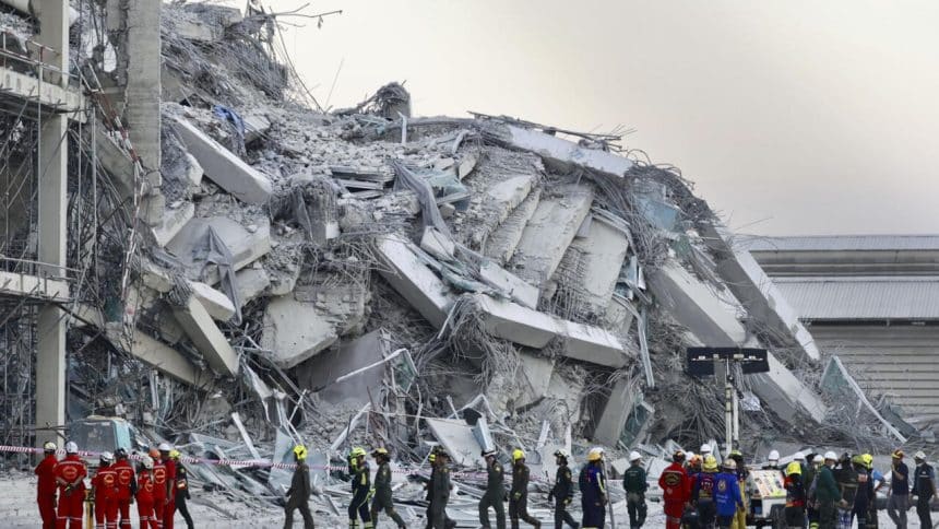 Rescue workers search through collapsed buildings after the Myanmar-Thailand earthquake.