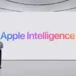 Apple executive presenting Apple Intelligence on stage.