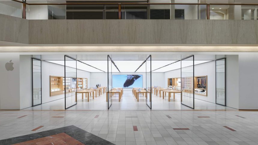 Apple Store at Northbrook Court mall with empty display tables and glass entrance.