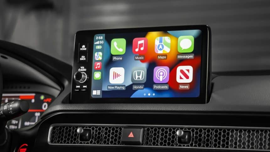 Car dashboard screen displaying Apple CarPlay interface.