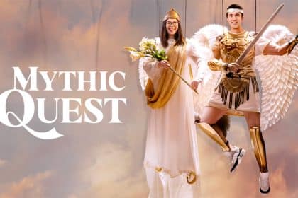 Two characters dressed as angelic warriors from Mythic Quest with show title displayed.