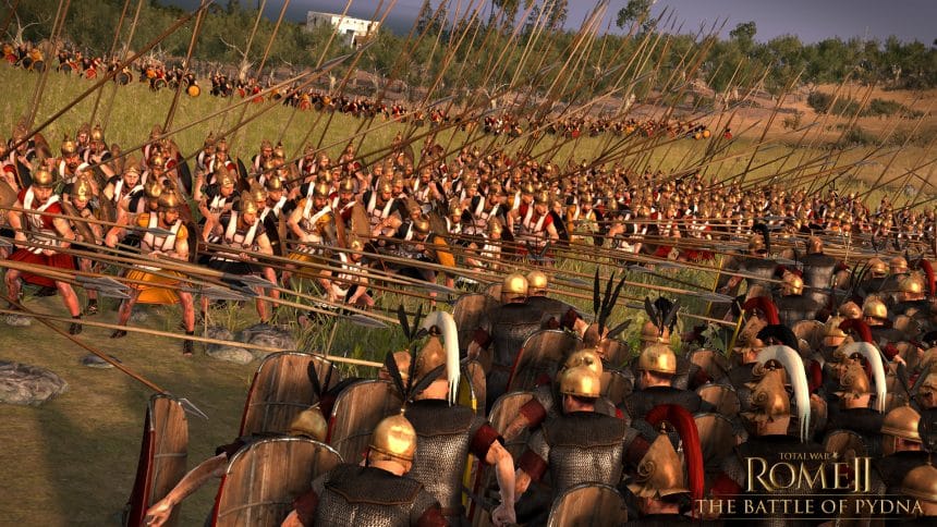 Roman and Greek soldiers clash with spears in a battle scene from Total War: Rome II.