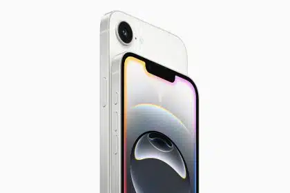 Close-up of two white iPhone 16e models showing the screen and rear camera.