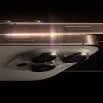 Close-up view of the iPhone 18 Pro with triple-lens camera and metallic finish.