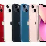 A lineup of iPhone 13 models in various colours, showcasing the back and front design.
