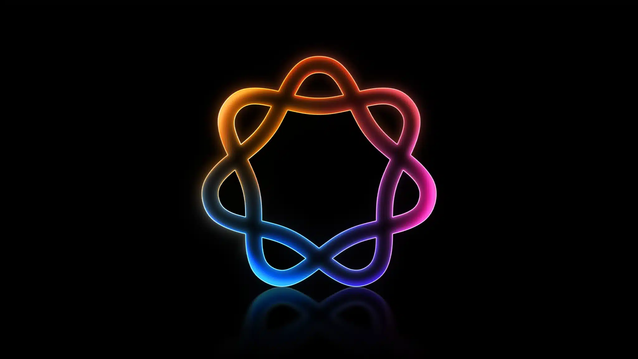 Glowing multicolored neon loop forming an abstract eight-pointed shape on a black background.