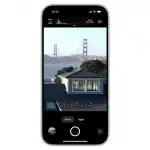 iPhone displaying Adobe Project Indigo’s camera interface with manual controls, histogram, and multi-frame zoom options.