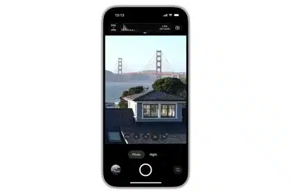 iPhone displaying Adobe Project Indigo’s camera interface with manual controls, histogram, and multi-frame zoom options.