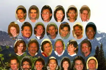 Group photo of the Power Mac G3 engineering team with a mountain background.