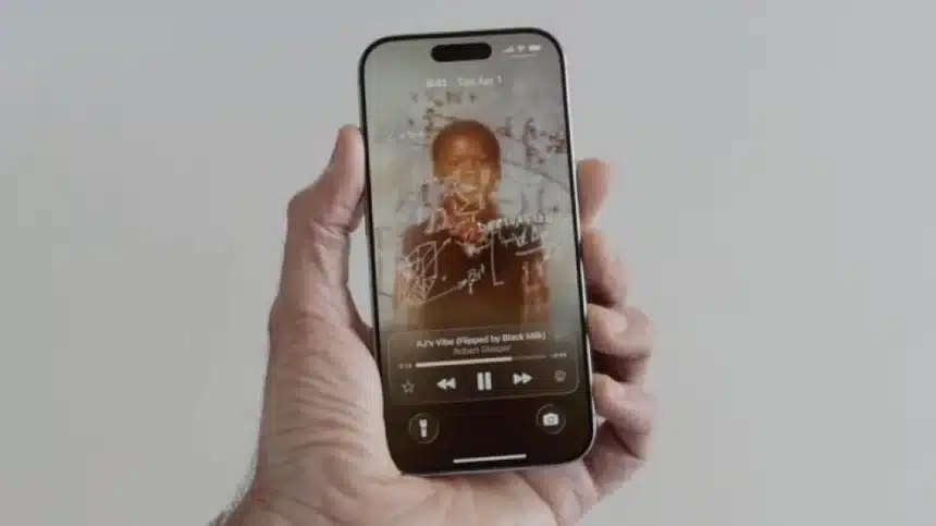 Hand holding an iPhone showing animated album art and music controls on the lock screen.