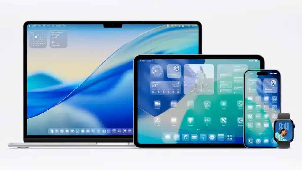 MacBook, iPad, iPhone, and Apple Watch showing the OS 26 home screens with widgets and app icons.