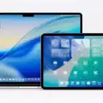 MacBook, iPad, iPhone, and Apple Watch side by side, each showing the new iOS and iPadOS 26 home screen.