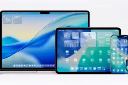 MacBook, iPad, iPhone, and Apple Watch side by side, each showing the new iOS and iPadOS 26 home screen.