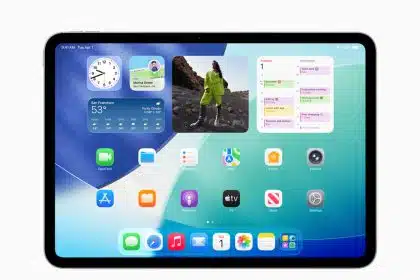 iPad home screen showing clock, weather, photo, and calendar widgets above app icons on a blue-green background.