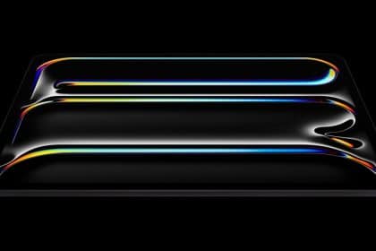 Artistic render of an iPad Pro with colorful light reflections on its surface.