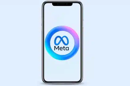 Smartphone screen displaying Meta logo with gradient circle on light blue background.