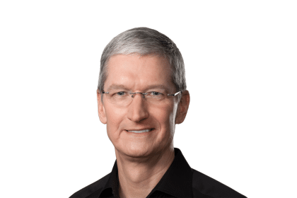 Portrait of Tim Cook wearing glasses and a black shirt on a white background.