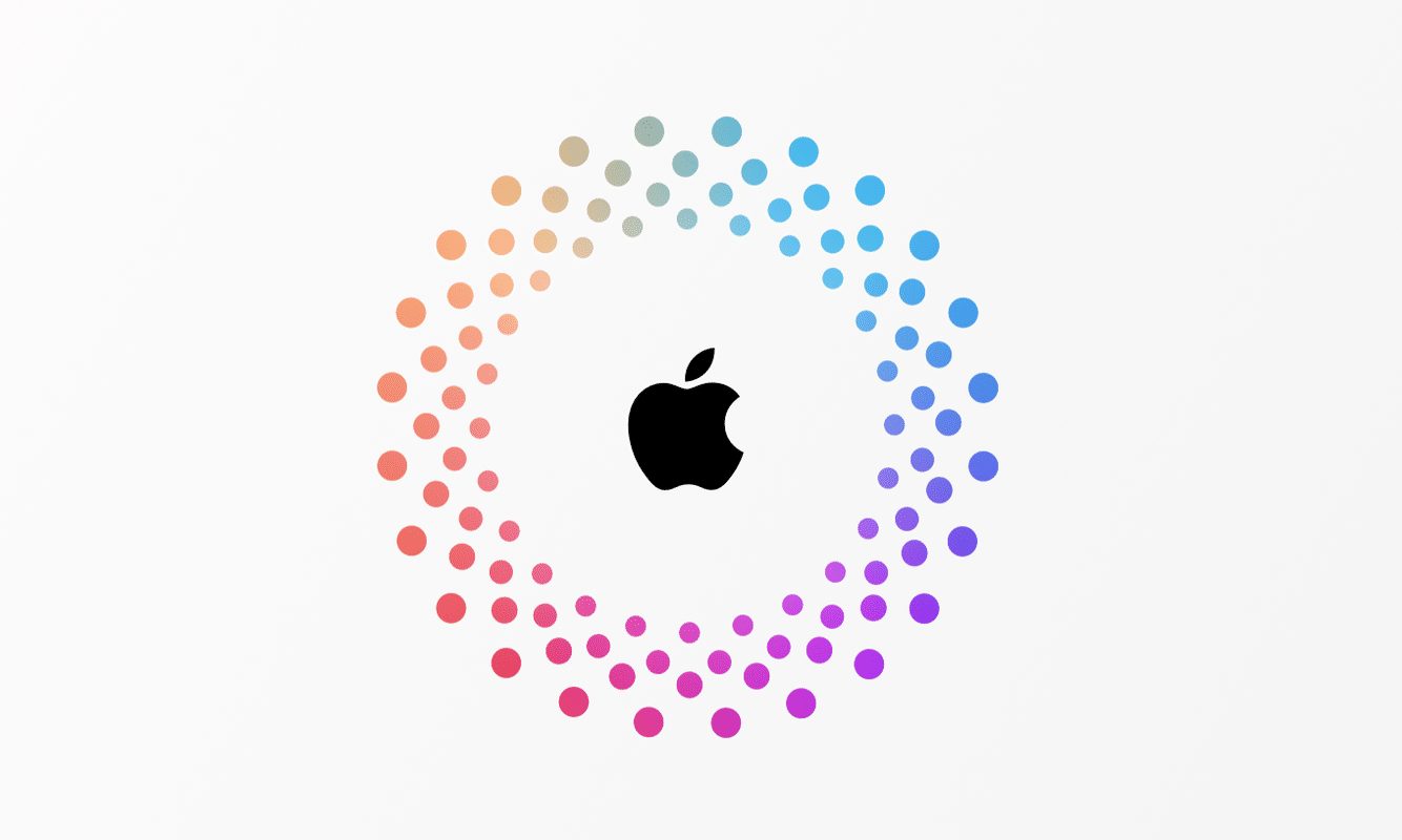 Apple logo surrounded by a colourful dotted circular pattern.