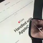 Apple Watch placed on an iPad displaying AppleCare information.