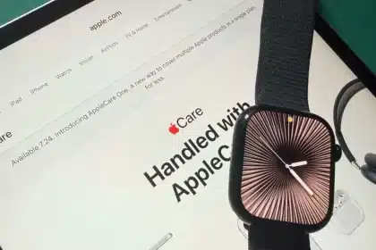 Apple Watch placed on an iPad displaying AppleCare information.