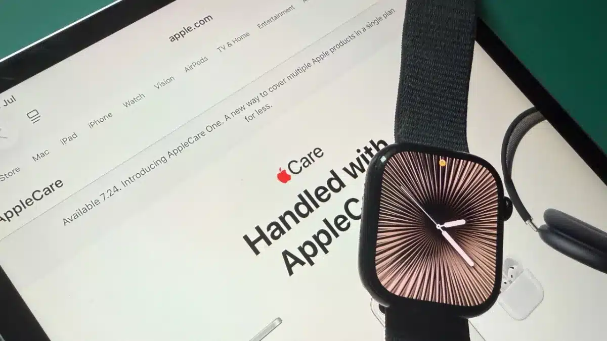 Apple Watch placed on an iPad displaying AppleCare information.