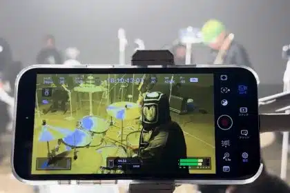 iPhone filming a drummer during Kroi's music video shoot