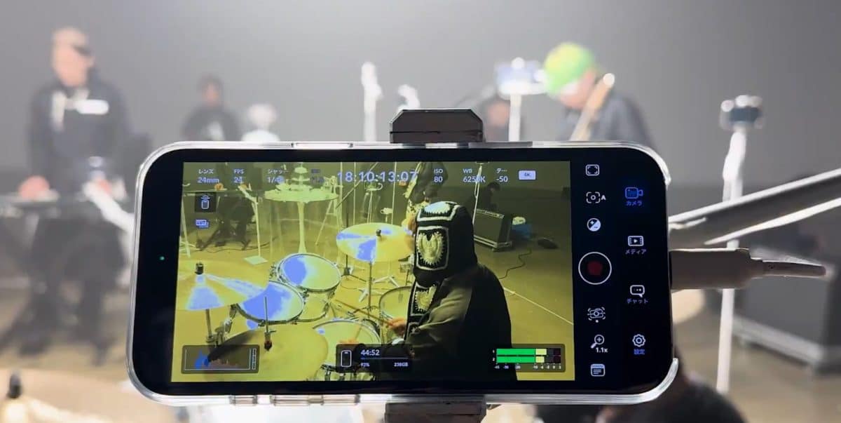 iPhone filming a drummer during Kroi's music video shoot