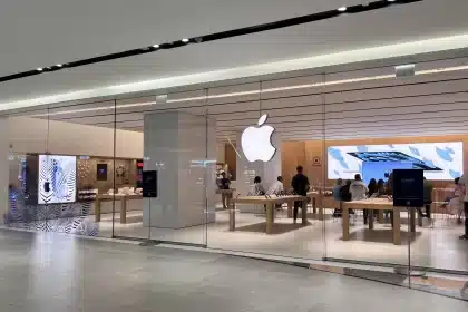 Apple Store at Phoenix Mall with glass front and customers inside.