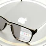 Concept image of Apple Glasses placed on a silver circular surface with the Apple logo.