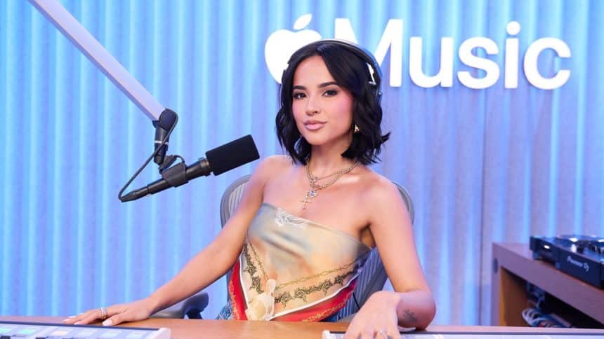 Woman hosting a radio show in an Apple Music studio.