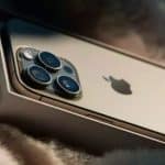 Close-up of an iPhone 16 Pro Max in its box.