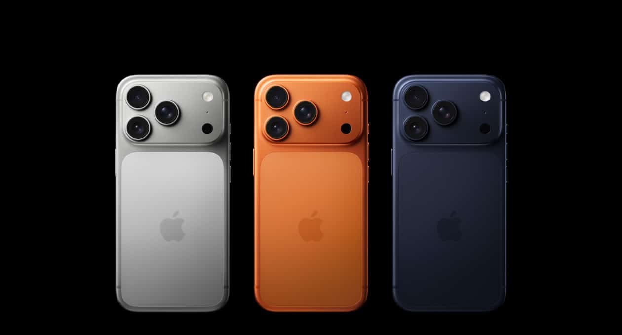 Three iPhone 17 Pro models in silver, orange, and dark blue displayed side by side against a black background.