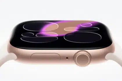 Apple Watch with a curved display and gold casing.