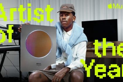 Tyler, the Creator holding his Apple Music Artist of the Year award.