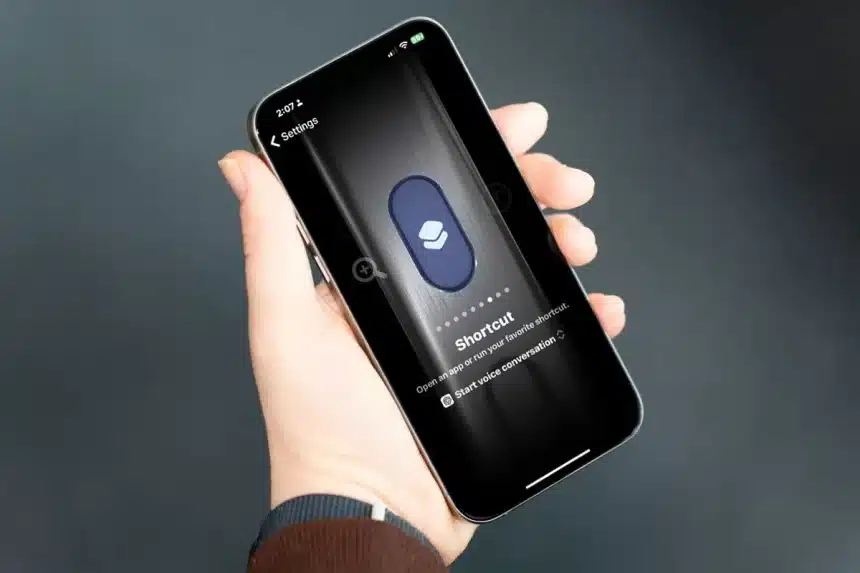 Person holding an iPhone showing a ChatGPT shortcut setup screen.