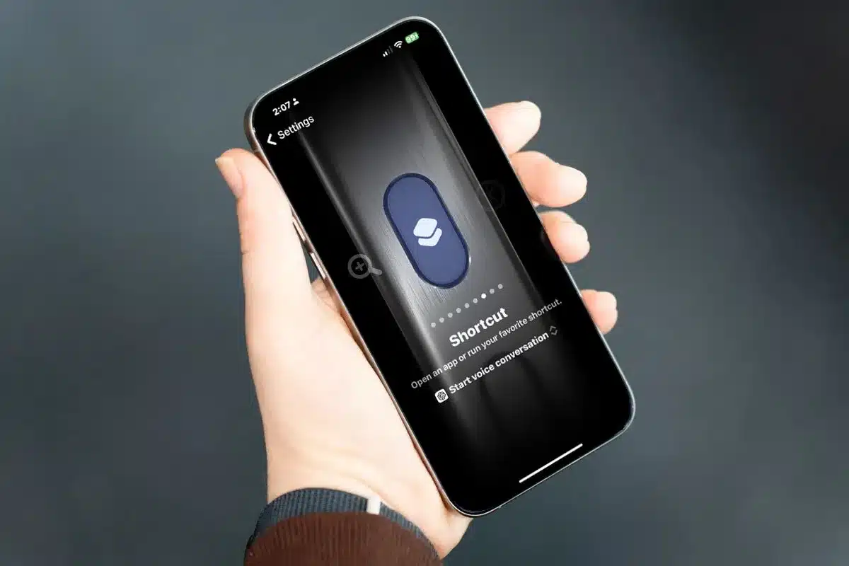 Person holding an iPhone showing a ChatGPT shortcut setup screen.