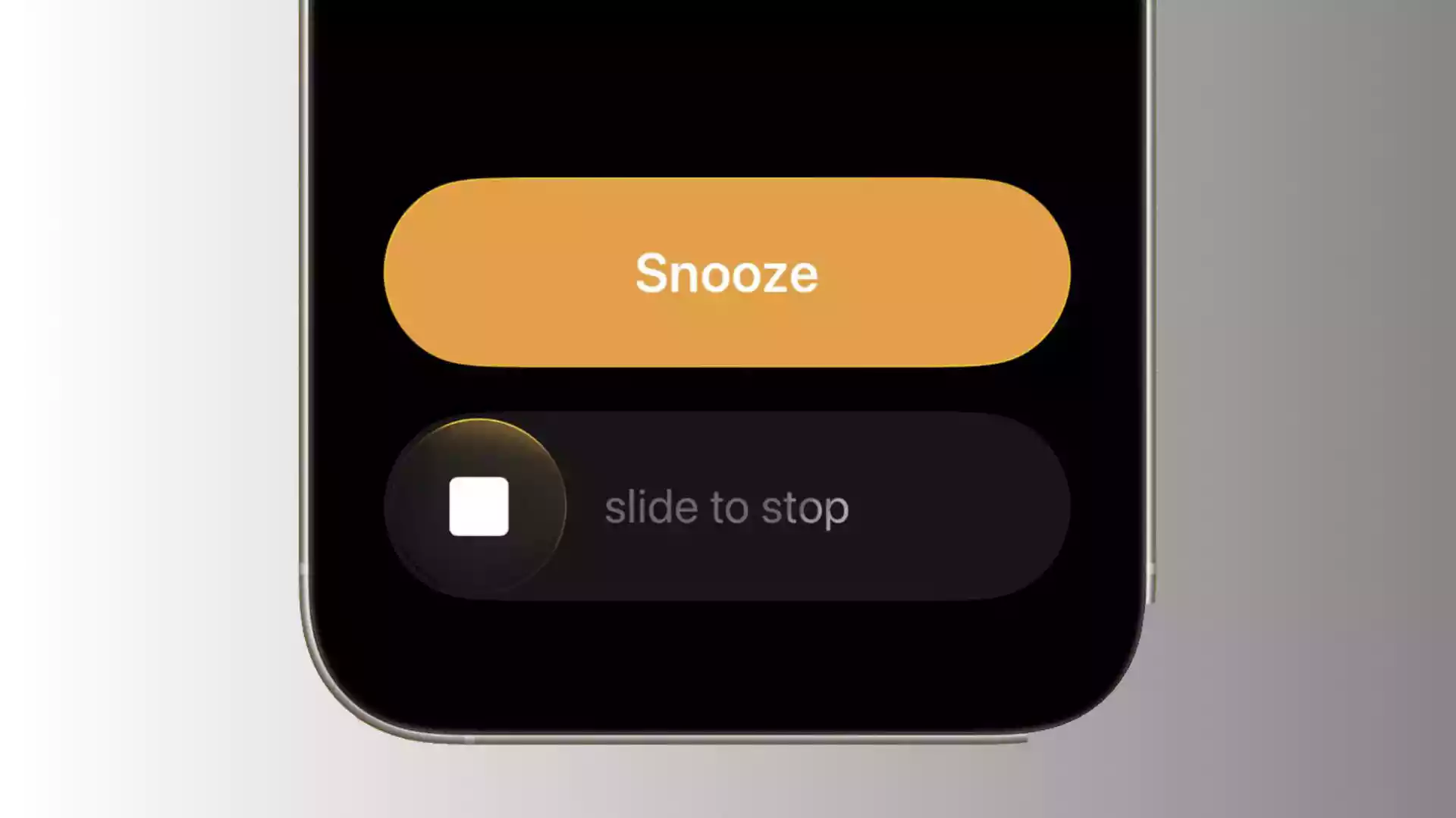 iPhone screen showing the new “slide to stop” alarm feature in iOS 26.1.