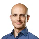 Portrait of Apple COO Sabih Khan against a white background.