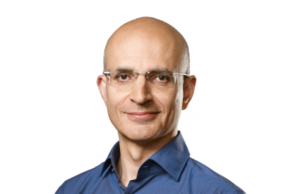Portrait of Apple COO Sabih Khan against a white background.
