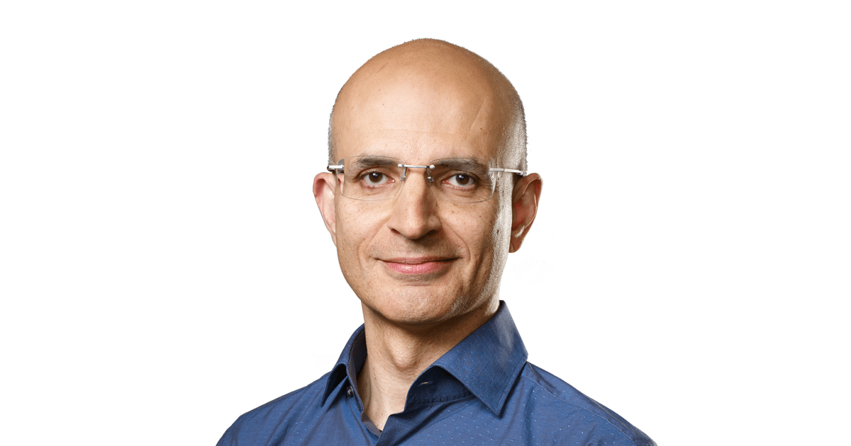 Portrait of Apple COO Sabih Khan against a white background.