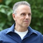 Johny Srouji standing outdoors, wearing a blue shirt.