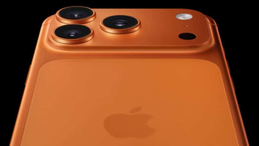 Close-up of an orange iPhone 17 Pro rear camera and Apple logo.
