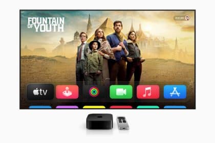 Apple TV interface displayed on a screen with a show and app icons.