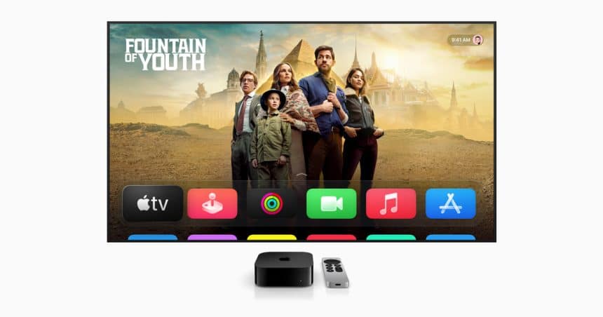 Apple TV interface displayed on a screen with a show and app icons.