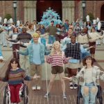 Students of diverse abilities performing together on a college campus.