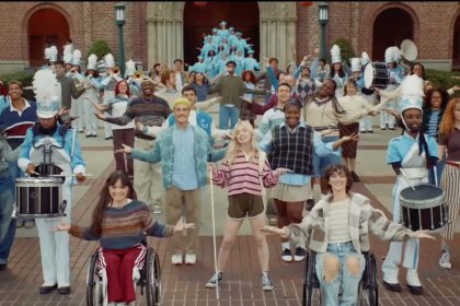 Students of diverse abilities performing together on a college campus.