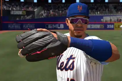 Baseball player in an MLB game holding a glove on the field.